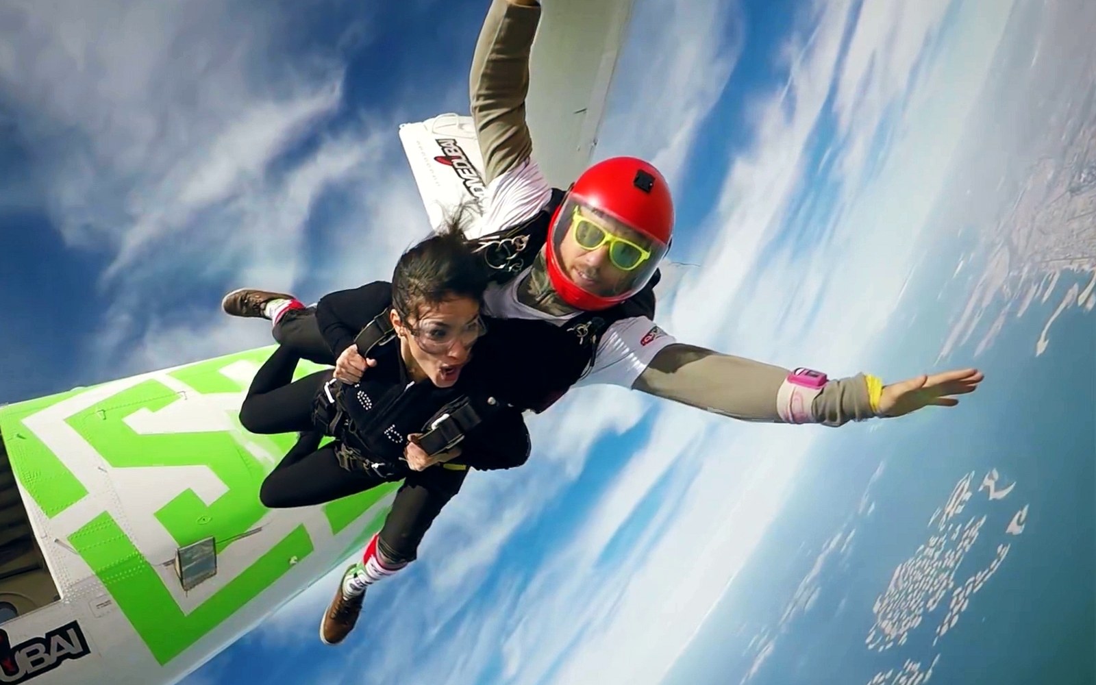 A tandem skydive over the Palm, from the Thrillark brand film